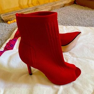 Red sock heels new never used